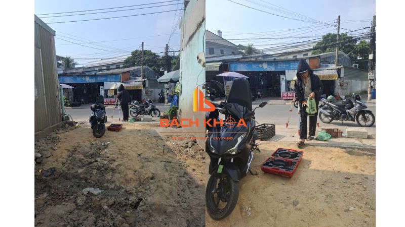 Kỹ thuật viên cắm mốc ranh đất bằng cọc sắt ngoài thực địa